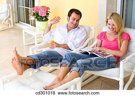 at-home, browsing, browse, barefoot, 30's View Large Photo Image Stock Photo - at-home, browsing, browse, barefoot, 30's. Fotosearch