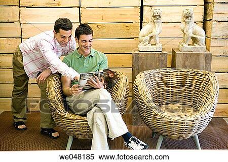 at-home, calm, browsing, browse, 30's View Large Photo Image Stock Photography - at-home, calm, browsing, browse, 30's. Fotosearch