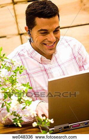 Stock Photograph - at-home, computer, 30's. Fotosearch