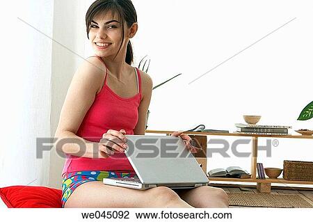 at-home, computer, brunette, 20's View Large Photo Image Stock Image - at-home, computer, brunette, 20's. Fotosearch