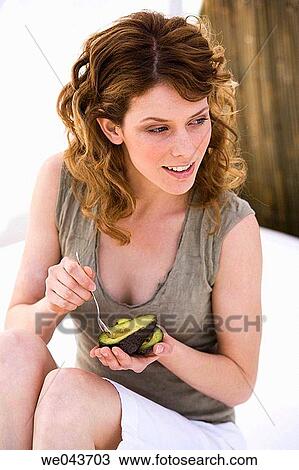 Avocado, Curly hair, 20's View Large Photo Image Stock Image - Avocado, Curly hair, 20's. Fotosearch
