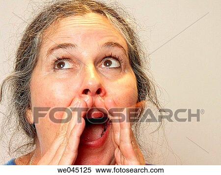 Stock Photography - baby boomer, concern, Close-up, askance. Fotosearch