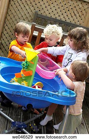 Stock Photo - baby, classroom, child, boy, amusement. Fotosearch