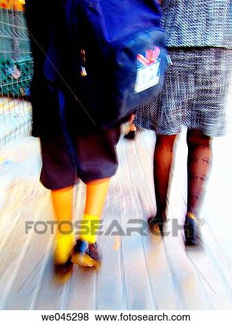 Stock Photo - back view, boy, blurred motion, backpack, anonymous. Fotosearch