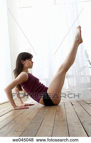 balance, calisthenics, brunette, at-home View Large Photo Image Stock Photo - balance, calisthenics, brunette, at-home. Fotosearch