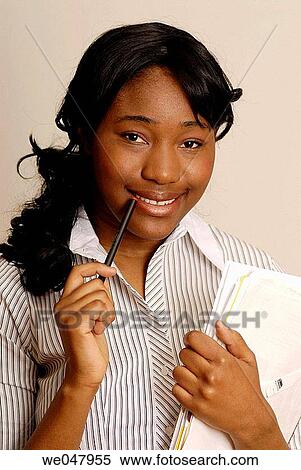 Stock Photography - Ball-point pen, businesspeople, business, black, African-American. Fotosearch