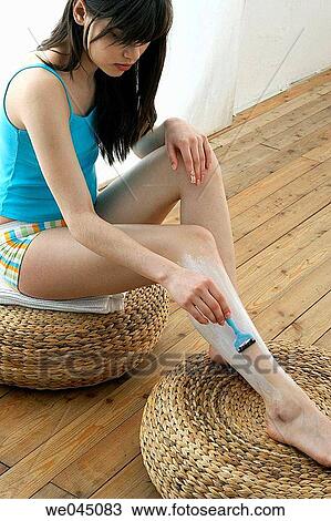 barefoot, brunette, Body care, at-home View Large Photo Image Stock Image - barefoot, brunette, Body care, at-home. Fotosearch