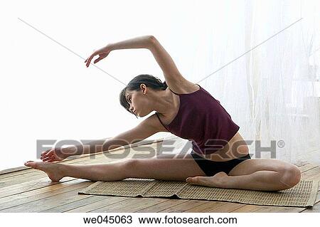 barefoot, calisthenics, brunette, at-home View Large Photo Image Stock Image - barefoot, calisthenics, brunette, at-home. Fotosearch
