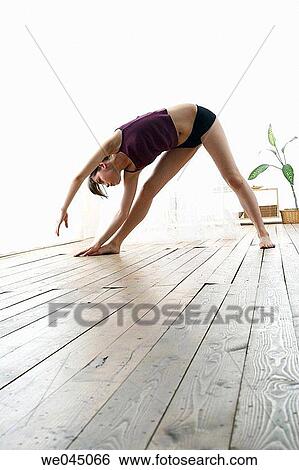 barefoot, calisthenics, brunette, at-home View Large Photo Image Stock Photograph - barefoot, calisthenics, brunette, at-home. Fotosearch