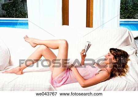 barefoot, calm, book, at-home View Large Photo Image Stock Photo - barefoot, calm, book, at-home. Fotosearch