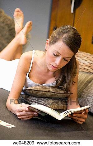 barefoot, calm, book, at-home View Large Photo Image Stock Photo - barefoot, calm, book, at-home. Fotosearch