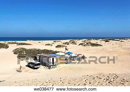Beach bar in dunes of Corralejo, Fuerteventura, Canary Islands View Large Photo Image Stock Photo - Beach bar in dunes of Corralejo, Fuerteventura, Canary Islands. Fotosearch