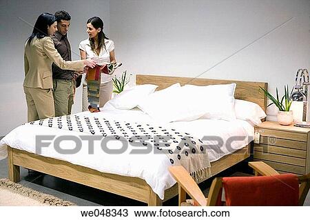 Stock Image - bed, bedroom, choice, choosing. Fotosearch