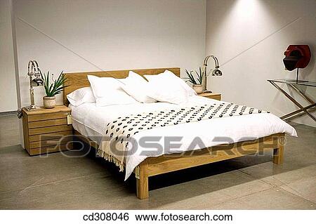 Stock Photograph - bed, bedroom, comfort, comfortable, concept. Fotosearch