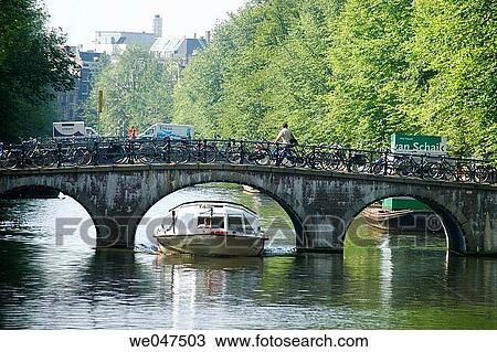 Bicycles and bridge. Amsterdam. Netherlands. View Large Photo Image Stock Image - Bicycles and bridge. Amsterdam. Netherlands.. Fotosearch