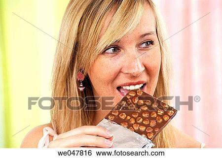 bite, calorie, blond, biting, askance View Large Photo Image Stock Photograph - bite, calorie, blond, biting, askance. Fotosearch