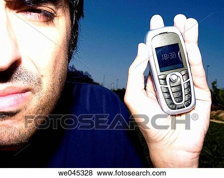 black hair, cell phone, Close-up View Large Photo Image Stock Photo - black hair, cell phone, Close-up. Fotosearch