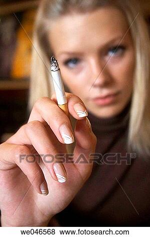 Stock Photo - blond, blurred, cigarette. Fotosearch