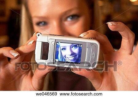 blond, Close-up, camera, amusement View Large Photo Image Stock Photo - blond, Close-up, camera, amusement. Fotosearch