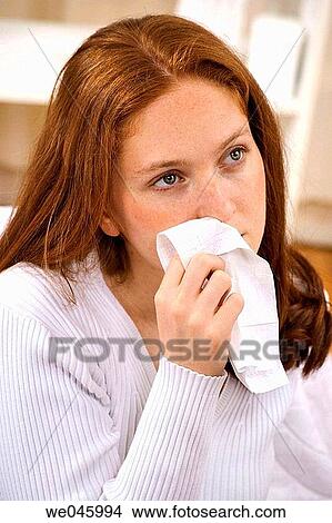 Blow nose, cold, Blowing nose, allergy View Large Photo Image Picture - Blow nose, cold, Blowing nose, allergy. Fotosearch