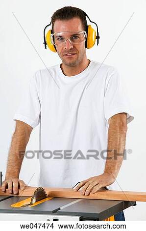 Picture - blue-collar, carpenter, Blue-collar worker, at-home. Fotosearch