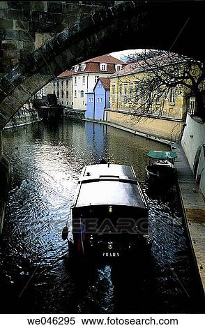 Boat plies the channel in Prague View Large Photo Image Stock Photography - Boat plies the channel in Prague. Fotosearch