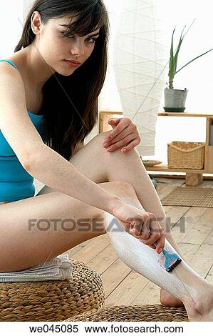 Body care, contemporary, brunette, at-home View Large Photo Image Stock Photography - Body care, contemporary, brunette, at-home. Fotosearch