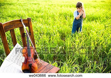 bow, chair, boy, art View Large Photo Image Stock Photograph - bow, chair, boy, art. Fotosearch