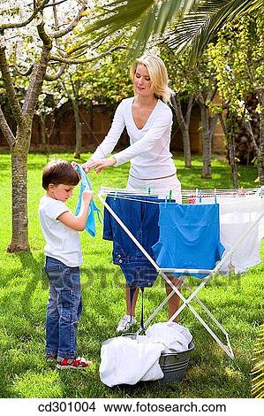 boy, bucket, child, clothesline View Large Photo Image Picture - boy, bucket, child, clothesline. Fotosearch