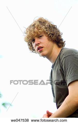 Stock Photo - boy, Curly hair, contemporary, adolescence. Fotosearch