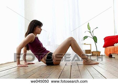 break, calisthenics, brunette, break-time, at-home View Large Photo Image Stock Image - break, calisthenics, brunette, break-time, at-home. Fotosearch