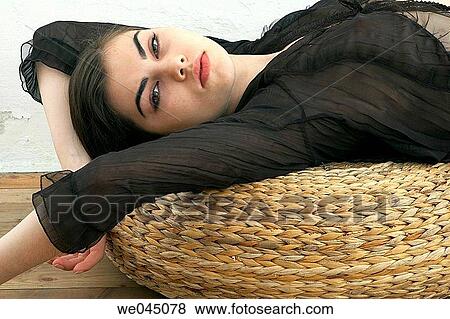 brunette, contemporary, cushion, dark hair View Large Photo Image Stock Photo - brunette, contemporary, cushion, dark hair. Fotosearch