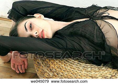brunette, contemporary, cushion, dark hair View Large Photo Image Stock Photo - brunette, contemporary, cushion, dark hair. Fotosearch