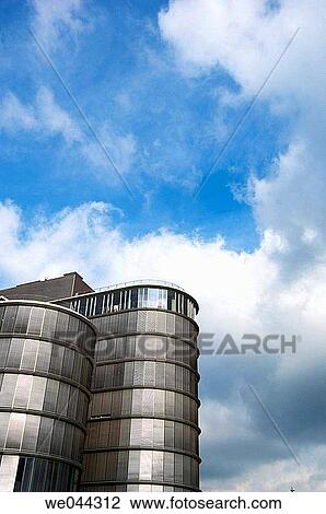 Stock Image - building, cloudy, cloud, city, architecture. Fotosearch