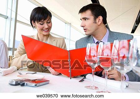 Stock Image - business, Business lunch, businessman, businesspeople, businesswoman. Fotosearch