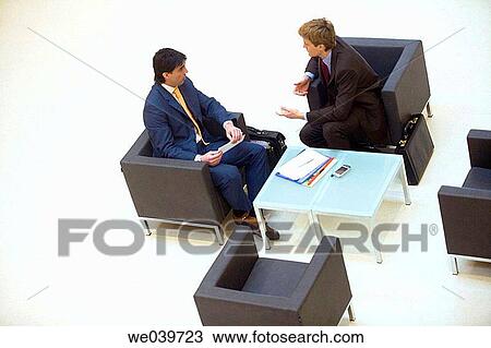 Stock Image - business, businesspeople, businessman, 30's. Fotosearch