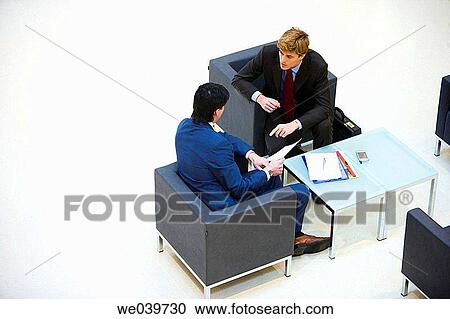 Stock Image - business, businesspeople, businessman, 30's. Fotosearch