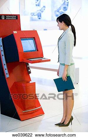 Stock Image - business, businesswoman, businesspeople, Attache case. Fotosearch