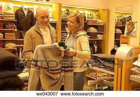 choice, Clothing store, choosing, 30's View Large Photo Image Stock Photo - choice, Clothing store, choosing, 30's. Fotosearch