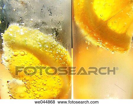 Stock Photo - Citrus fruit, Alcoholic beverage, citrus, bubble, Alcoholic drink, alcohol. Fotosearch