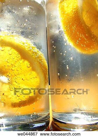Stock Photo - Close-up, Alcoholic drink, Citrus fruit, citrus, bubble, alcohol. Fotosearch
