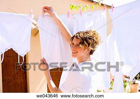 Stock Photograph - clothes, clothesline, clothespeg, clothespin. Fotosearch
