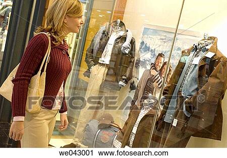 Stock Image - Clothing store, contemporary, 30's. Fotosearch
