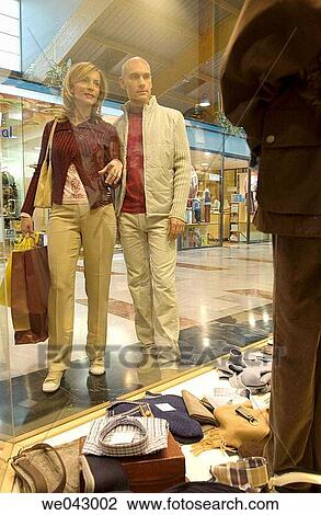 Clothing store, contemporary, couple View Large Photo Image Stock Image - Clothing store, contemporary, couple. Fotosearch