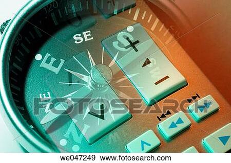 Compass and remote control View Large Photo Image Stock Photo - Compass and remote control. Fotosearch