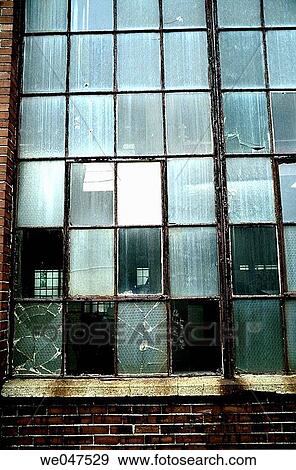 Empty factory and broken windows, Maine View Large Photo Image Stock Photo - Empty factory and broken windows, Maine. Fotosearch