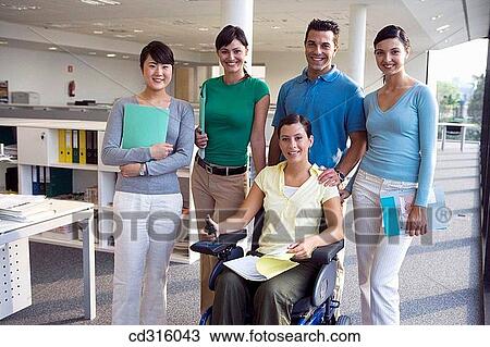 Stock Image - Fatronik Research Centre, San Sebastian Technological Park, Donostia, Gipuzkoa, Basque Country. Business people; handicapped woman. Fotosearch