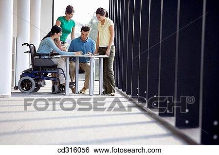Fatronik Research Centre, San Sebastian Technological Park, Donostia, Gipuzkoa, Basque Country. Business people; handicapped woman View Large Photo Image Stock Photograph - Fatronik Research Centre, San Sebastian Technological Park, Donostia, Gipuzkoa, Basque Country. Business people; handicapped woman. Fotosearch