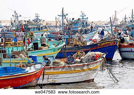 Fishermen boats along the sea side Corniche near the fishmarket. City of Alexandria. Egypt View Large Photo Image Stock Image - Fishermen boats along the sea side Corniche near the fishmarket. City of Alexandria. Egypt. Fotosearch