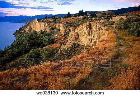 Footpath winds along top of bluffs north of Penticton. British Columbia, Canada. View Large Photo Image Stock Image - Footpath winds along top of bluffs north of Penticton. British Columbia, Canada.. Fotosearch